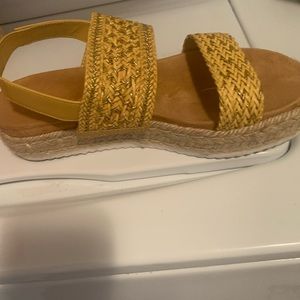 Worn a few times yellow sandals Size 9. Very Comfortable